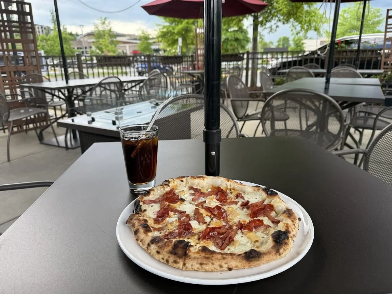 A pepperoni pizza on the patio at World of Pizzas Bar & Grill